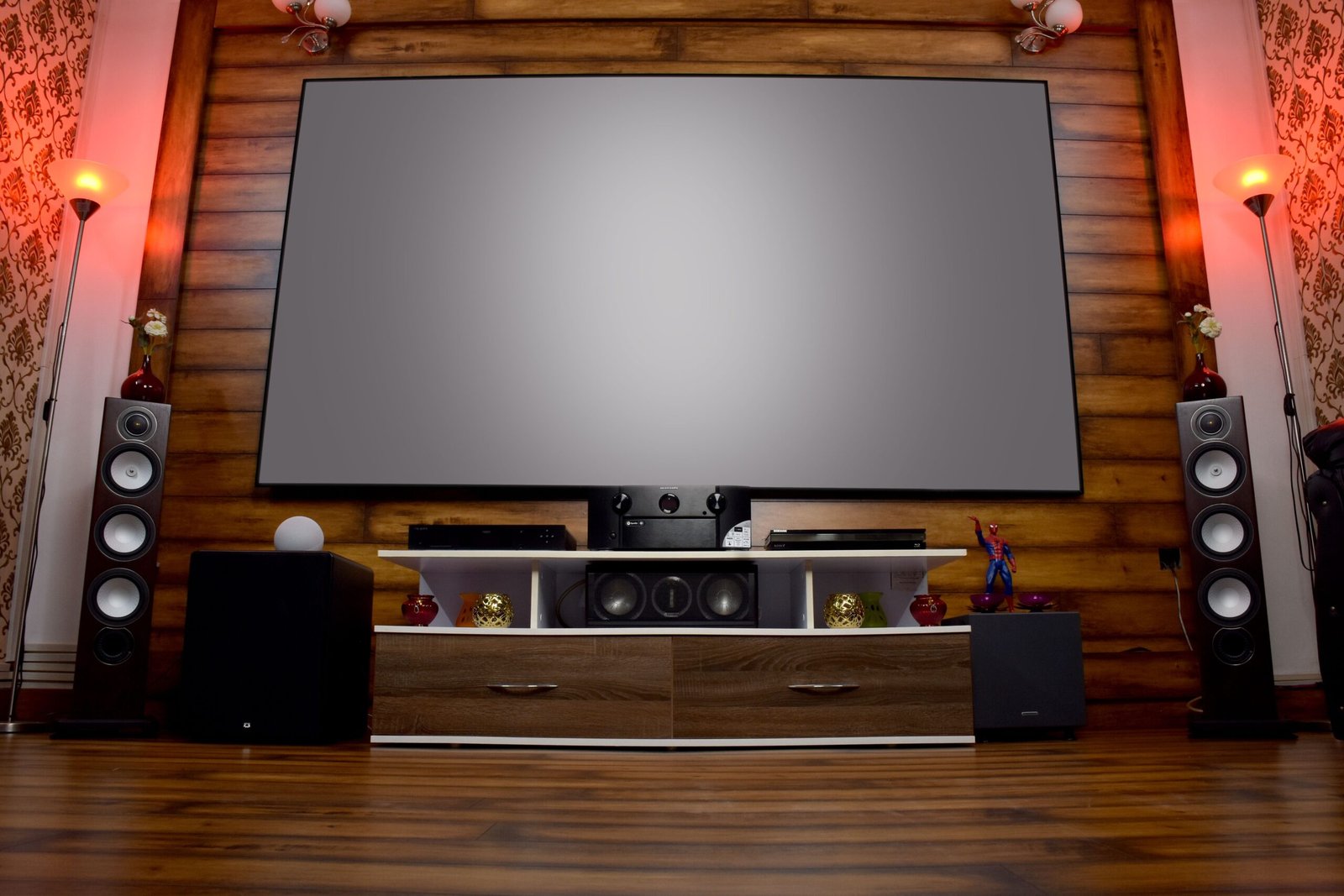 Living room set for a science-fiction movie marathon with projector, sci‑fi props, snacks, and a printed watchlist.