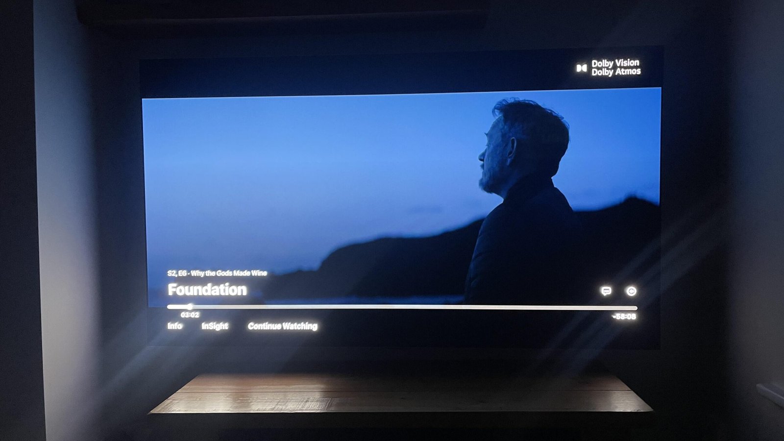 OLED television displaying subtitles while timing and brightness are adjusted