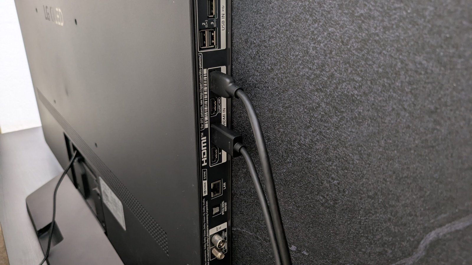 HDMI cable connected to a television port for selecting the correct 4K HDR input